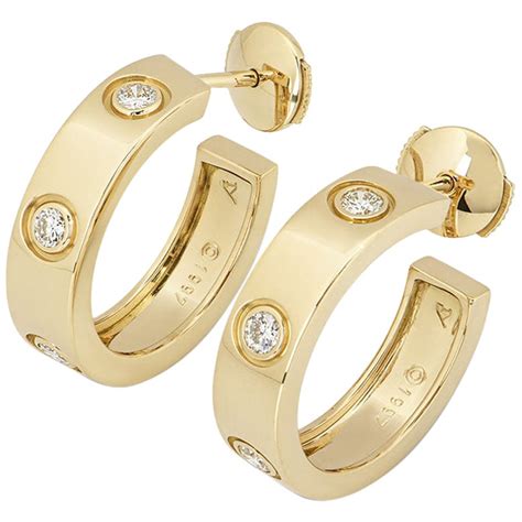 cartier style gold hoop earrings.